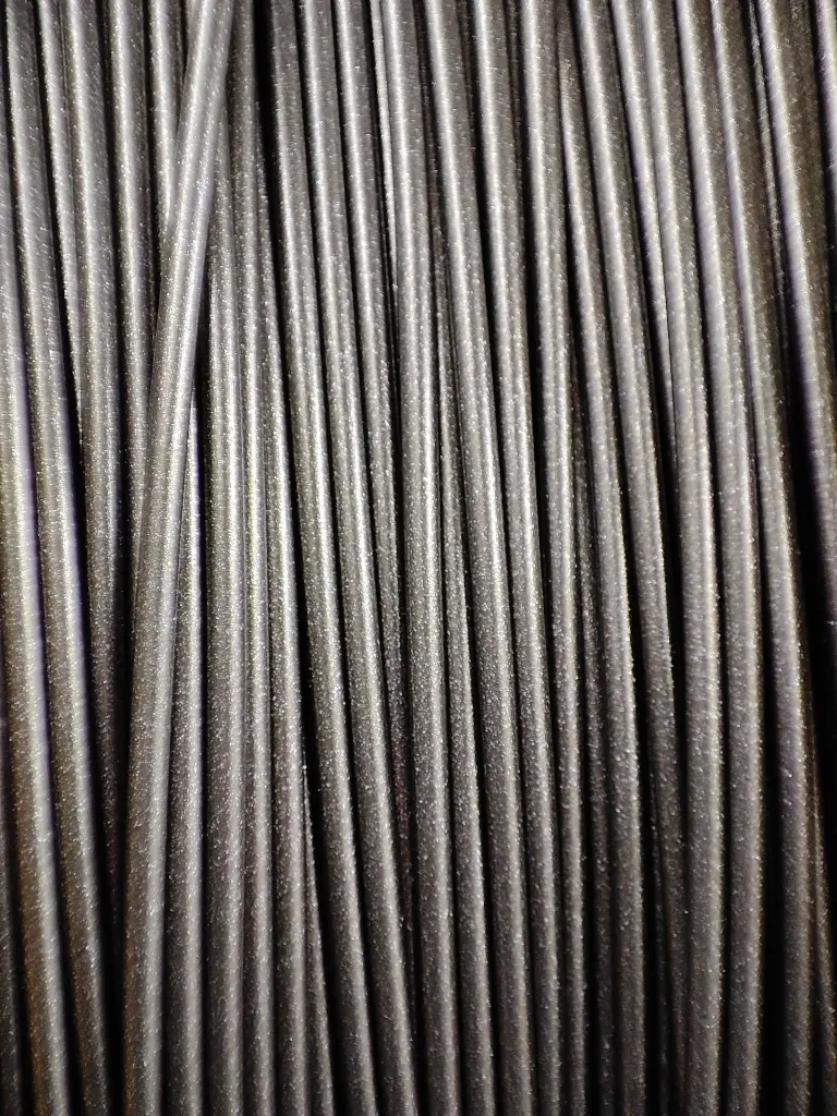 HTPLA+ Cosmic Magnetism Grey (cardboard) - zoom.webp