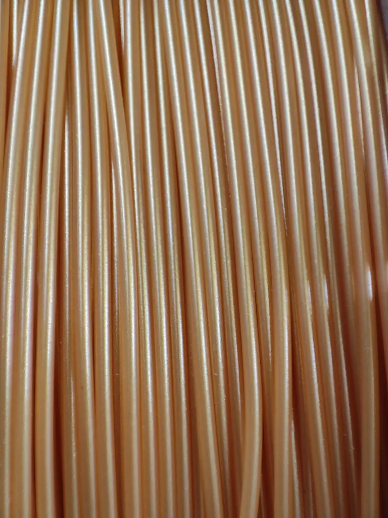 HTPLA+ Critical Mass Gold (cardboard) - zoom.webp